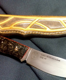 нож из Böhler M390 microclean и киринита (застывшая лава), мастер Геннадий Немов из Самары