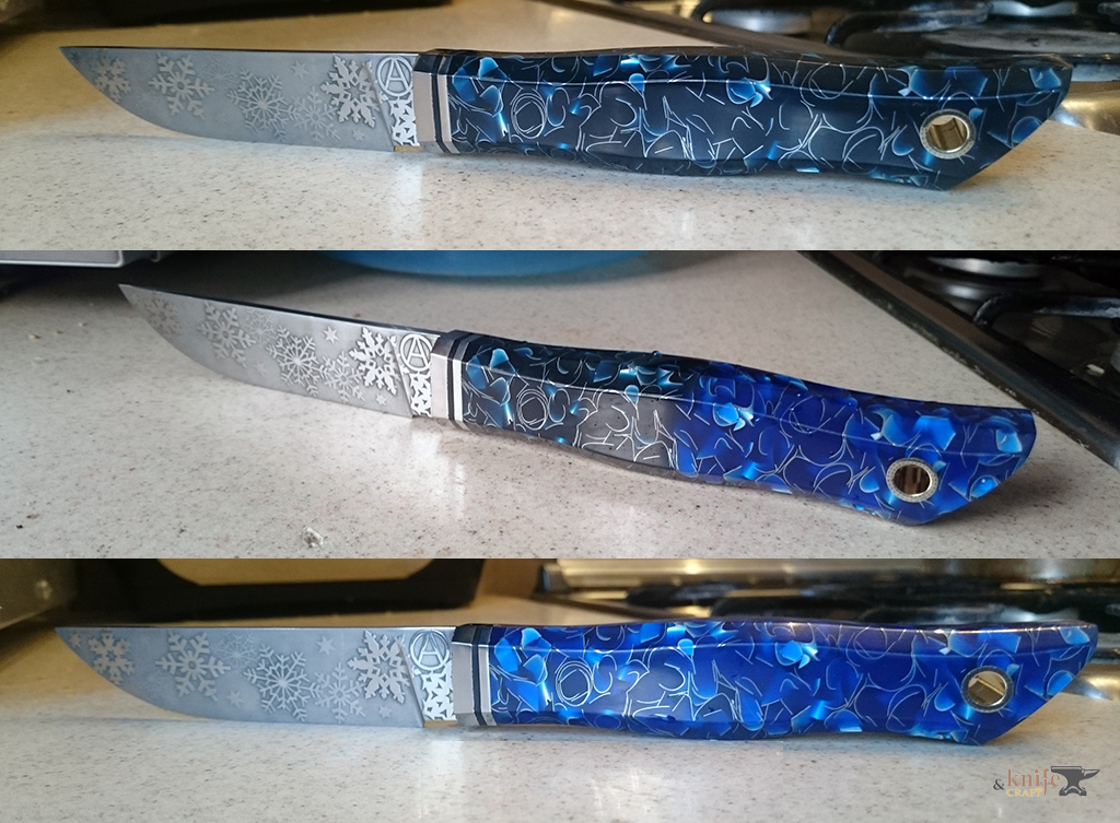 нож зимний с синей рукояткой из рафира и снежинками на клинке ручной работы в Туле