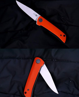 orange little Russian folder knife flipper